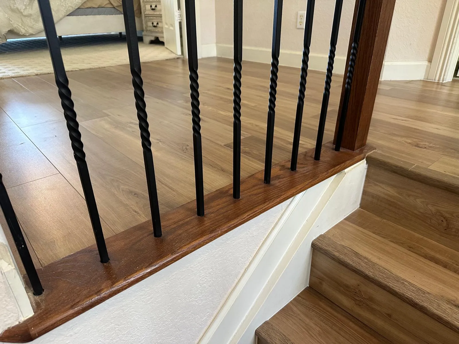 Stair railing and wood-look flooring, flooring installation in Port St Lucie, FL